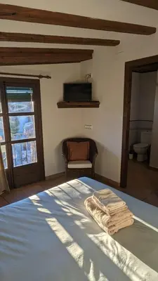 Cama o camas de una habitación en Cal Tous, La Socarrimada