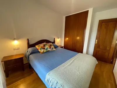 Cama o camas de una habitación en C18 - Alojamiento Mirador de Cerler - Villmor