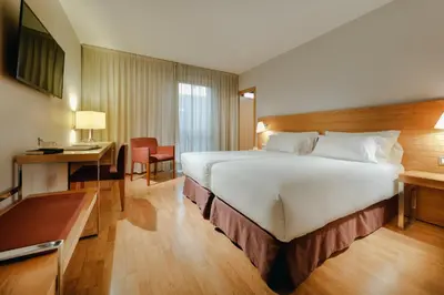 Cama o camas de una habitación en Hesperia Zaragoza Centro
