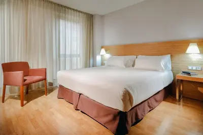 Cama o camas de una habitación en Hesperia Zaragoza Centro