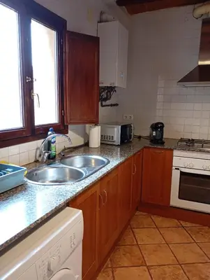 Una cocina o zona de cocina en Ca L'Aida Rural 2