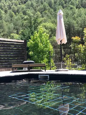 Piscina en o cerca de Acogedora casa en la montaña