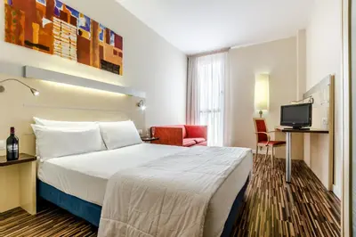 Cama o camas de una habitación en Hotel YIT Ciudad De Zaragoza