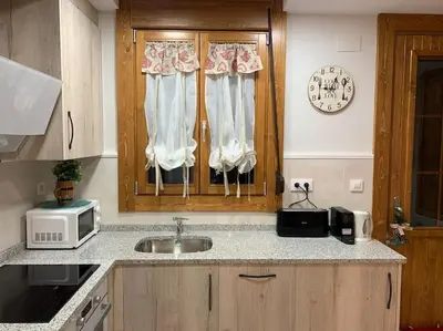 Una cocina o zona de cocina en La Casa de la Colonia