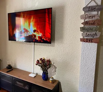 Una televisión o centro de entretenimiento en Casa Tere Panticosa