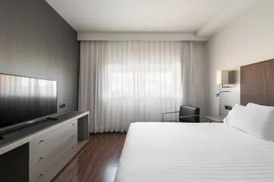 Cama o camas de una habitación en Exe Zizur Pamplona