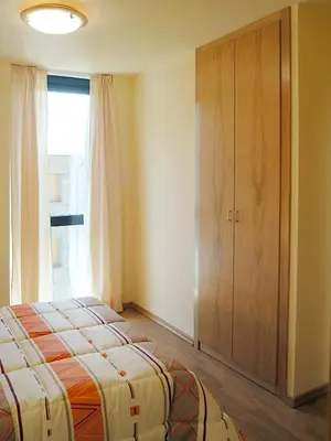 Cama o camas de una habitación en Aparthotel Nou Vielha