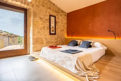 Cama o camas de una habitación en Hotel japonès Puigpinós