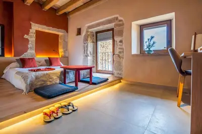 Cama o camas de una habitación en Hotel japonès Puigpinós
