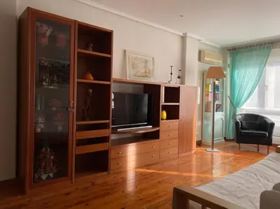 Una televisión o centro de entretenimiento en Atico lira