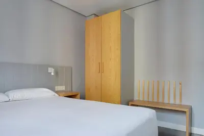 Cama o camas de una habitación en Hotel Avenida