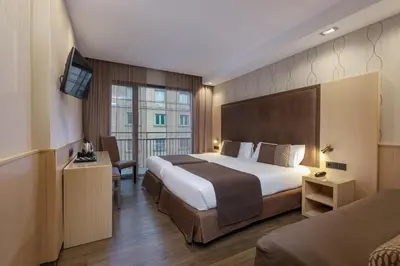 Cama o camas de una habitación en Hotel Pedro I De Aragon 4 Estrellas SUPERIOR