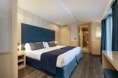 Cama o camas de una habitación en Hotel Pedro I De Aragon 4 Estrellas SUPERIOR