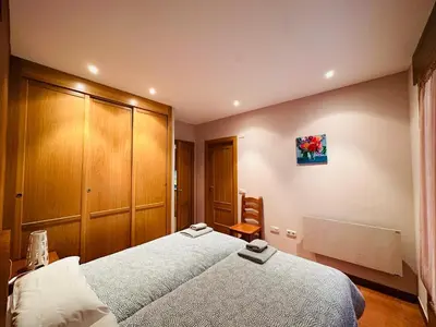 Cama o camas de una habitación en Apartamento Carlos Bielsa