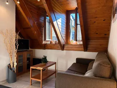Una televisión o centro de entretenimiento en Chimenea y piscina-Dúplex perfecto para todo el año - Herbasabina 4