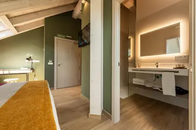 Cama o camas de una habitación en Silken Puerta de Irati