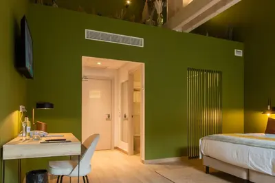 Cama o camas de una habitación en Silken Puerta de Irati