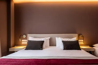 Cama o camas de una habitación en Silken Puerta de Irati