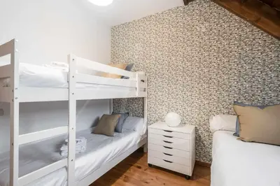 Cama o camas de una habitación en Tanau 1700 by SeaMount Rentals