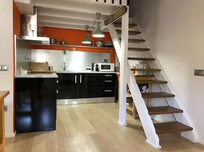Una cocina o zona de cocina en Precioso Ático duplex en vielha para 6 pax