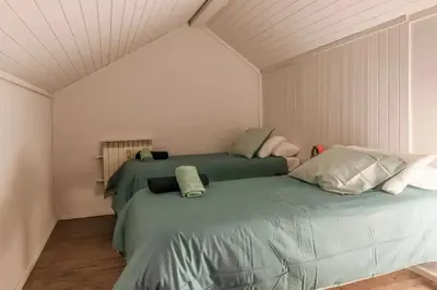 Cama o camas de una habitación en Precioso Ático duplex en vielha para 6 pax