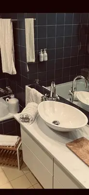 Un baño de Estilosa casa golf suites
