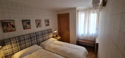 Cama o camas de una habitación en Salamandra Panticosa