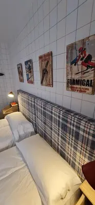 Cama o camas de una habitación en Salamandra Panticosa