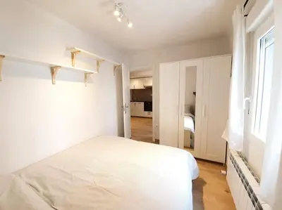 Cama o camas de una habitación en Acogedor piso en el centro de Sabiñanigo