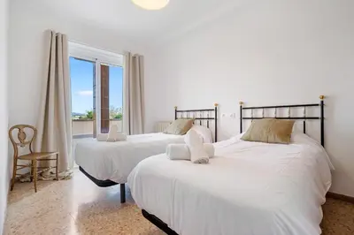 Cama o camas de una habitación en Hauzify I Vila Ducal