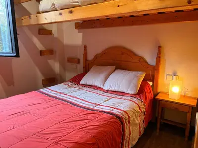 Cama o camas de una habitación en Espacio exterior cómodo- Tu planta baja rústica - Besiberri 7