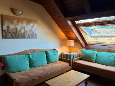 Zona de estar de Triplex espectacular- Comodidad, fuego y vistas - Erta 8