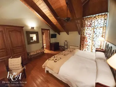 Cama o camas de una habitación en Conde Aznar