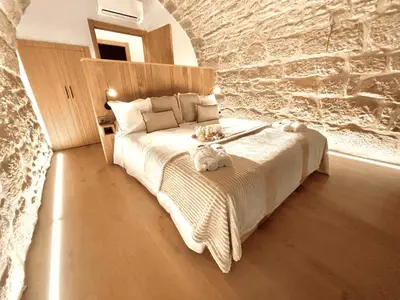 Cama o camas de una habitación en Torre Medieval de Queralt & Spa