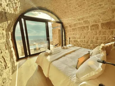 Cama o camas de una habitación en Torre Medieval de Queralt & Spa