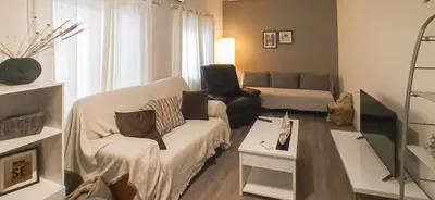Una televisión o centro de entretenimiento en Gran piso pleno centro. Plaza del Pilar + Desayuno