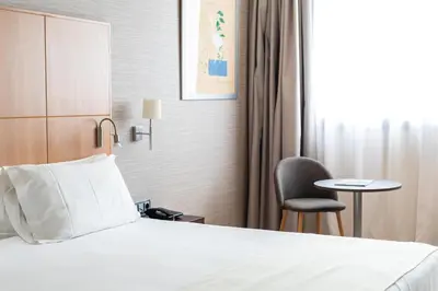 Cama o camas de una habitación en Abba Huesca