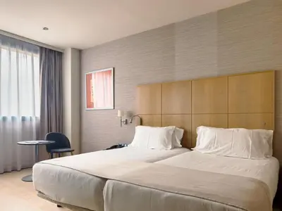 Cama o camas de una habitación en Abba Huesca