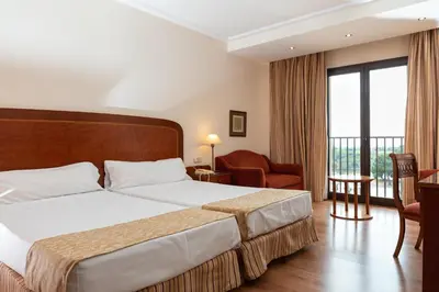 Cama o camas de una habitación en Termes Montbrio Hotel & Spa