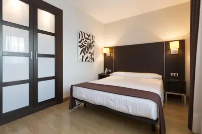 Cama o camas de una habitación en Hotel Plazaola