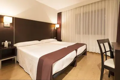Cama o camas de una habitación en Hotel Plazaola