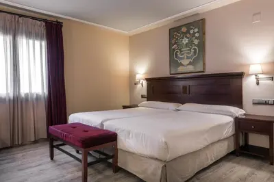Cama o camas de una habitación en SNÖ Villa de Sallent 4