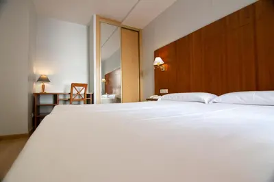 Cama o camas de una habitación en Hotel Hispania