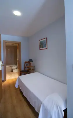 Cama o camas de una habitación en Hotel Hispania