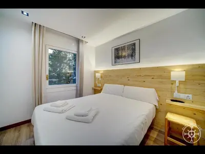 Cama o camas de una habitación en MONTLUDE de Alma de Nieve