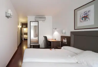 Cama o camas de una habitación en Hotel Yoldi