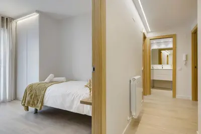 Cama o camas de una habitación en Apartamentos La muralla de Jaca