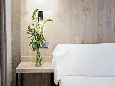 Cama o camas de una habitación en Hotel Albret