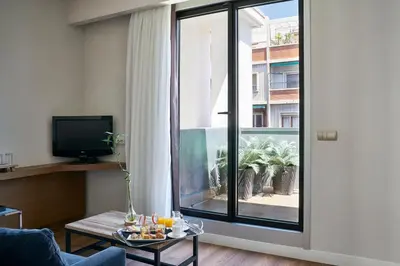 Una televisión o centro de entretenimiento en Vincci Zaragoza Zentro