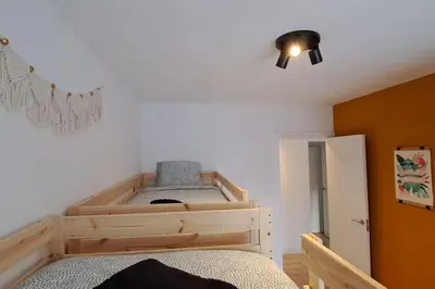 Cama o camas de una habitación en Piso acogedor en los Pirineos